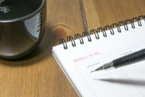 weekly planner on table