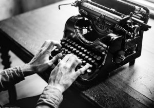 hands on a typewriter